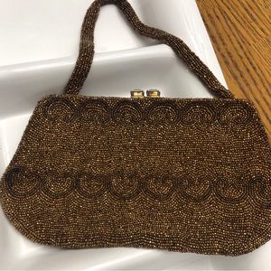 Vintage beaded handbag with rhinestone closure